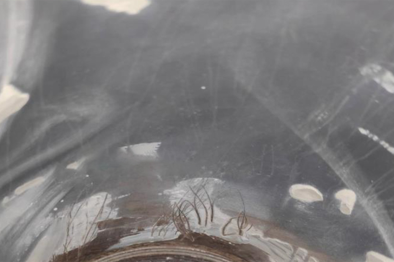 The surface of the equipment flow part after testing with MODENGY 1014 coating on it. Cement stone sticking-on is virtually absent The surface of the equipment flow part after testing with MODENGY 1014 coating on it. Cement stone sticking-on is virtually absent