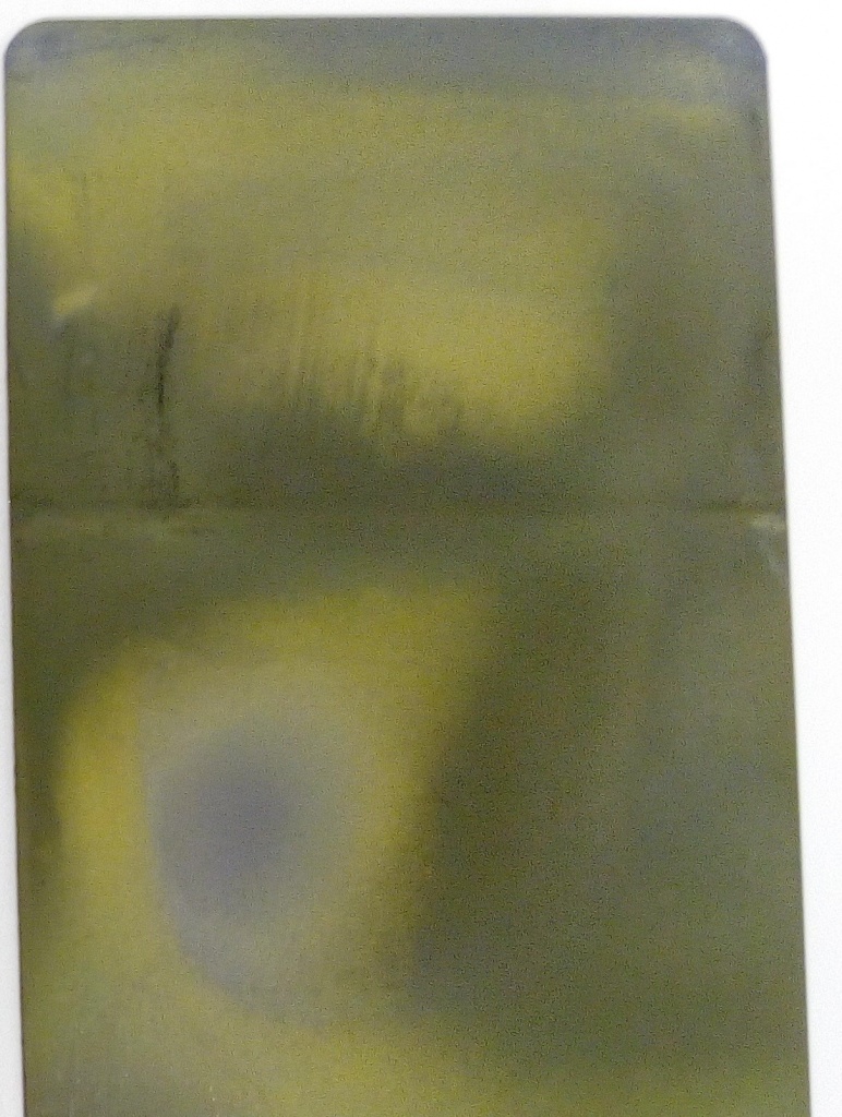 Oxidation of molybdenum disulfide in the coating composition (grey) with forming molybdenum trioxide(yellow) at heating above +400 ºС