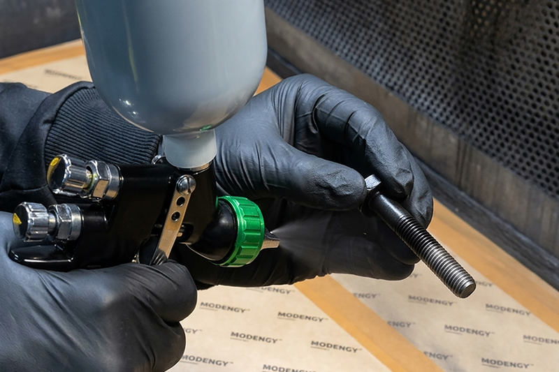 Applying MODENGY 1039 coating by the method of spraying out