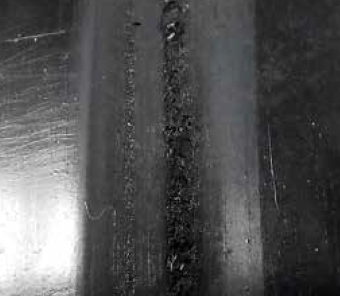 The appearance of the surface damage of the rubber part caused by increased friction